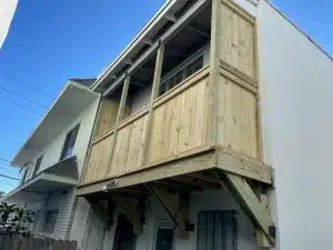 DOP provided inspection and designed a Wood covered balcony